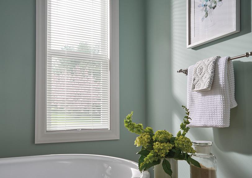 Beautiful bathrooms deserve beautiful blinds. Get a polished look that holds up in moist conditions and offers the privacy you need with these stylish Aluminum Blinds.  BudgetBlindsLosGatos  AluminumBlinds  MoistureResistantBlinds  BlindedByBeauty  FreeConsultation  WindowWednesday