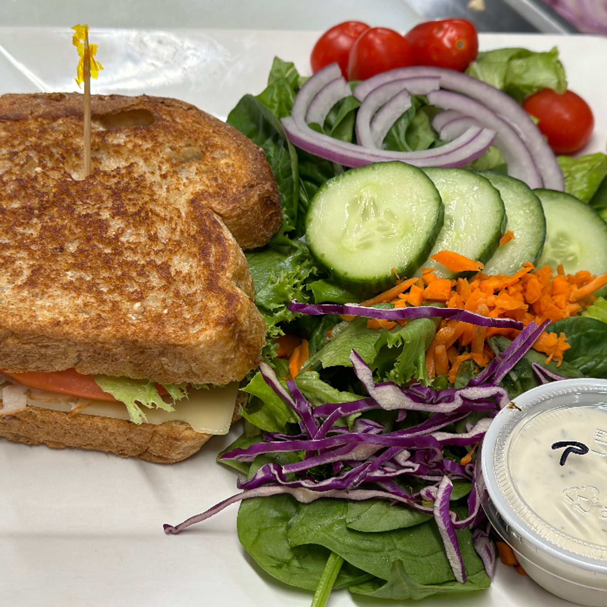 1/2 Sandwich & 1/2 Mixed Green Salad