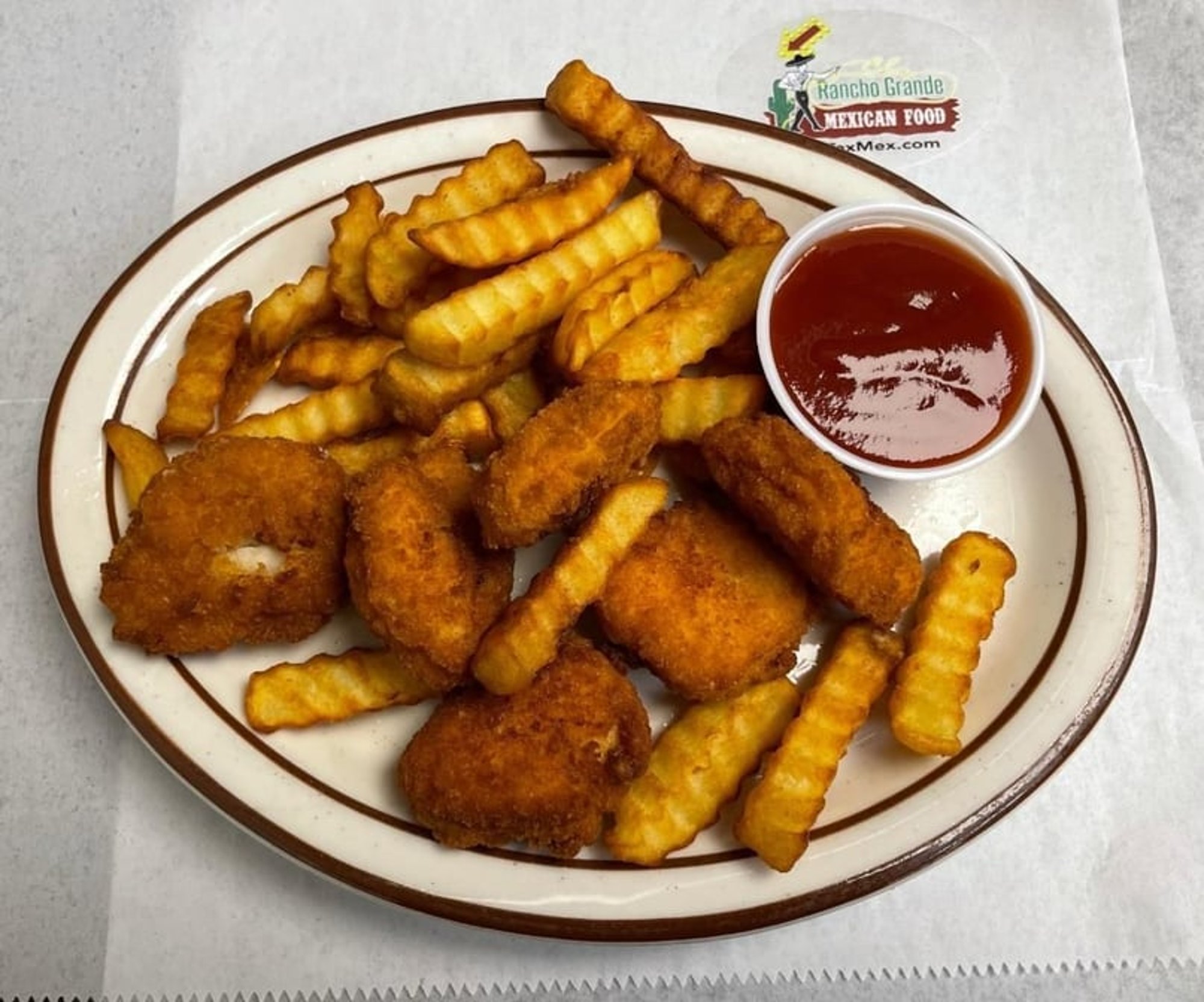 Kid's Chicken Nuggets & Fries