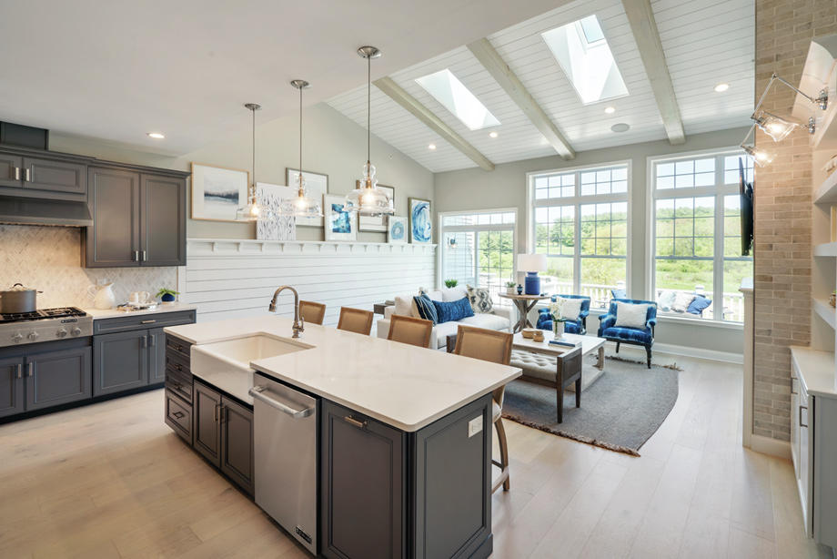 Kitchen open to great room with fireplace