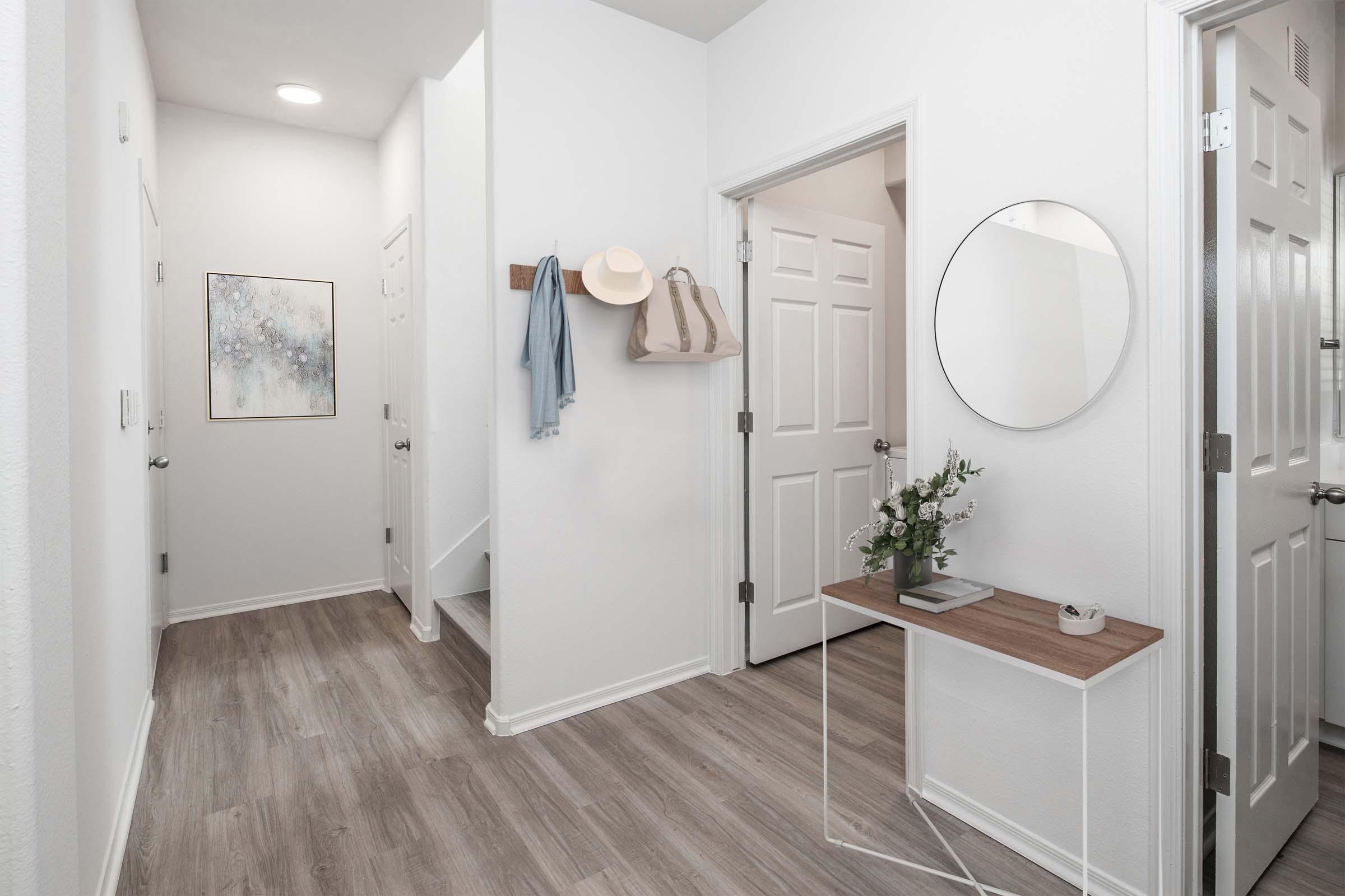 Entryway foyer in townhome near powder room