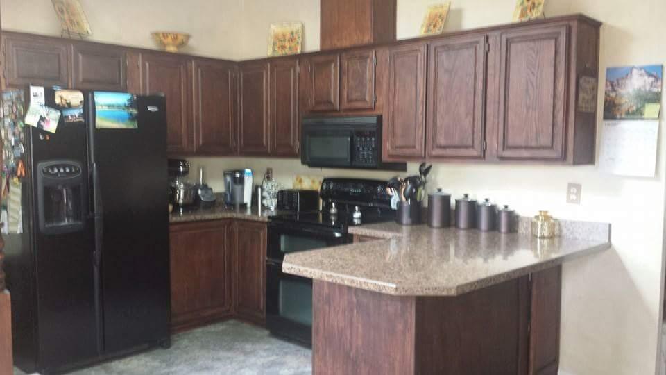 transformed dated orange oak cabinets with a rich espresso stain