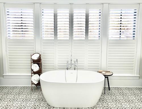 Our shutters add a radiant, classic touch to this bathroom, while providing ample privacy. Not only are these shutters cordless and easy to use, they're durable and simple to clean - perfect for bathrooms and kitchens.