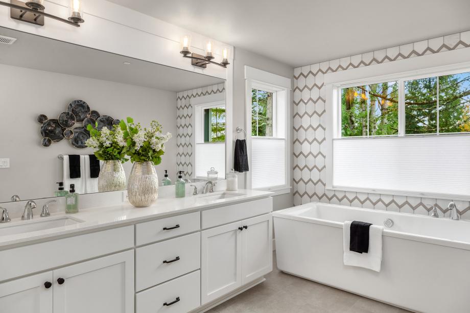 Luxe 5-piece bathroom with freestanding tub and a dual-sink vanity