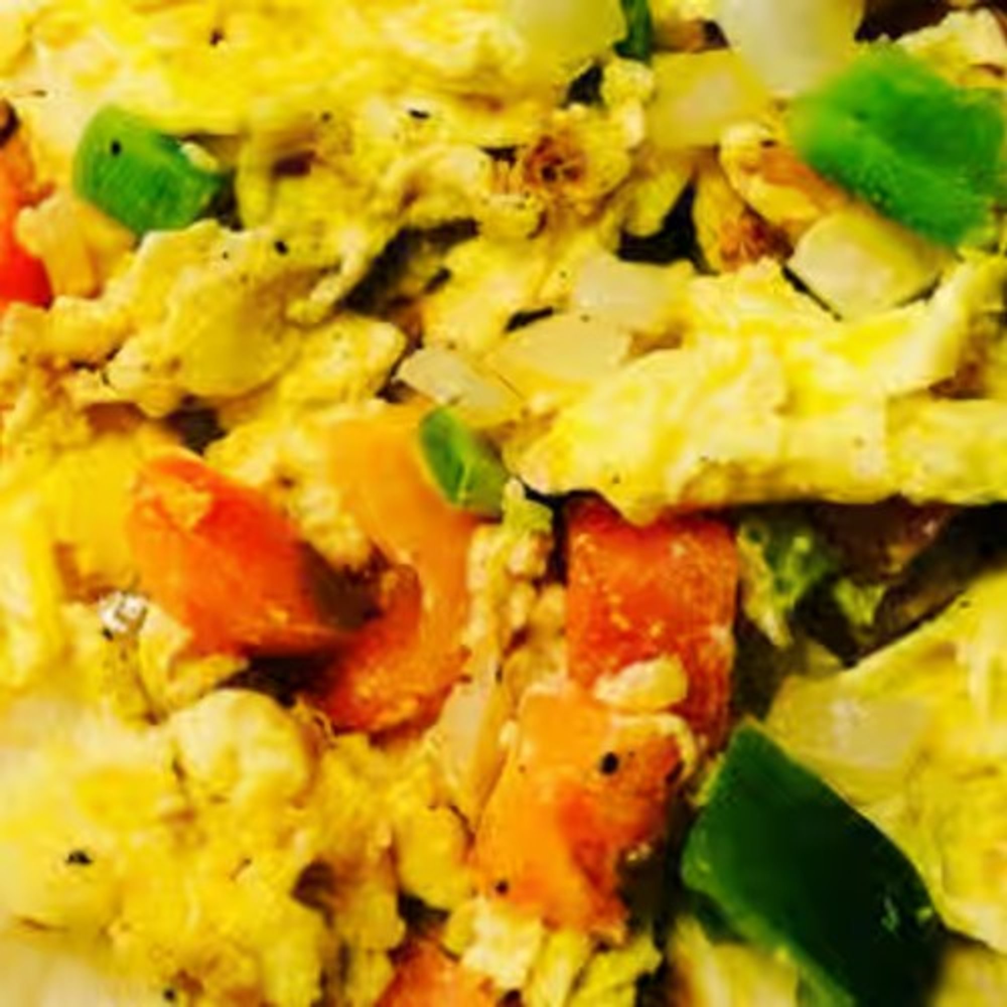 Migas: Eggs, Onion, Tomatoes, Bell Peppers, & Tortilla Chips