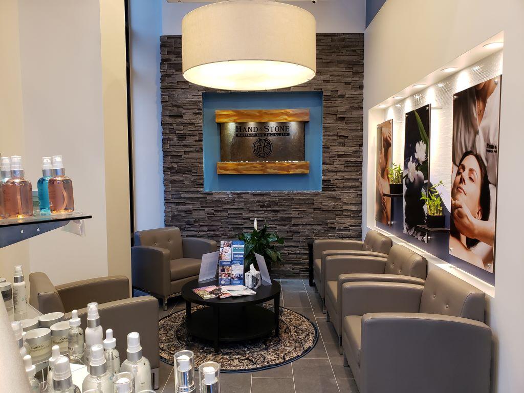 Hand and Stone Massage and Facial Spa Logo