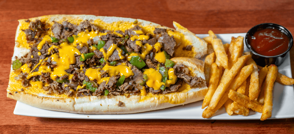 Philly Cheese Steak, Crispy fries.