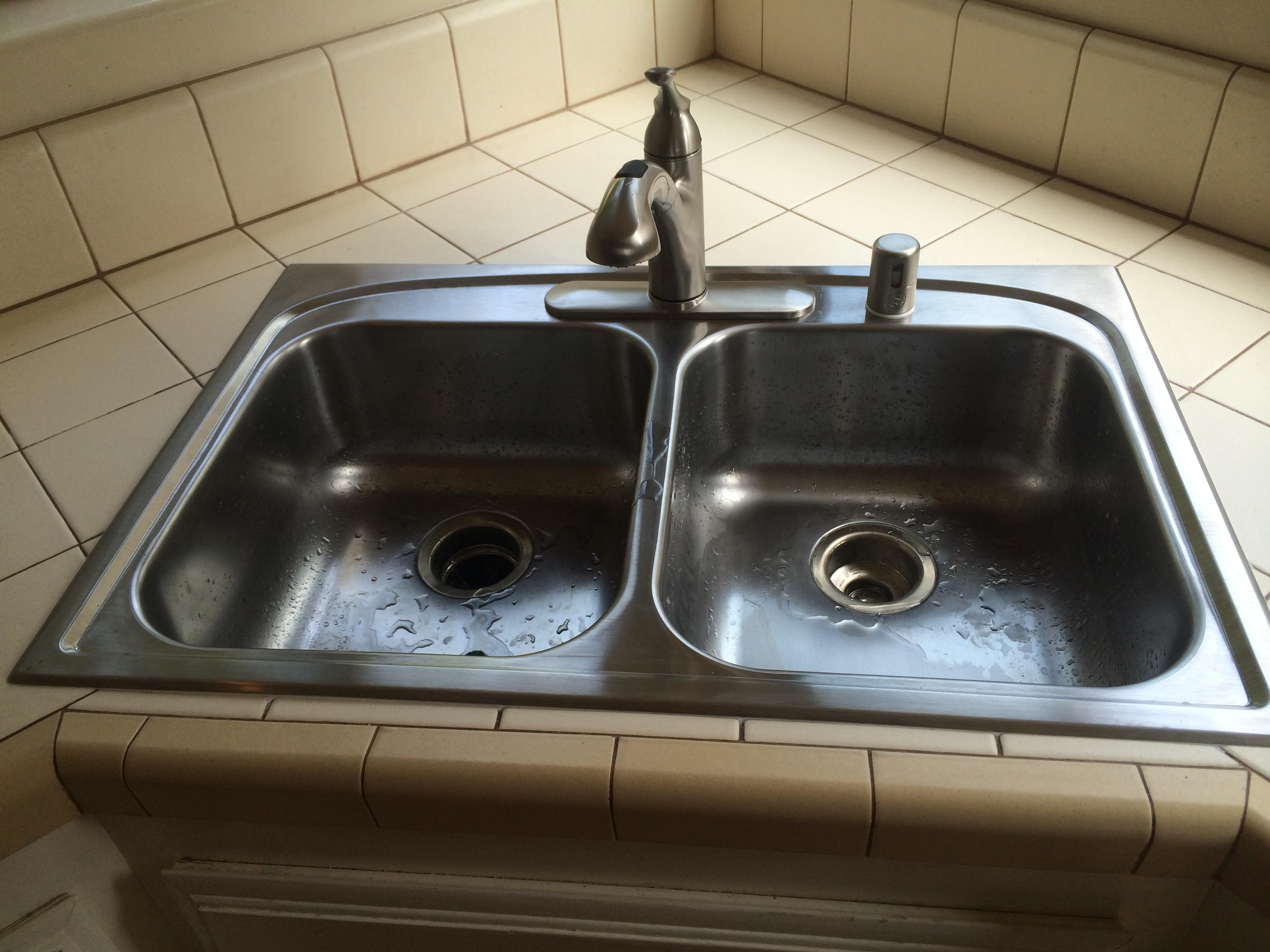 Removed under the counter sink to install this over the counter sink.