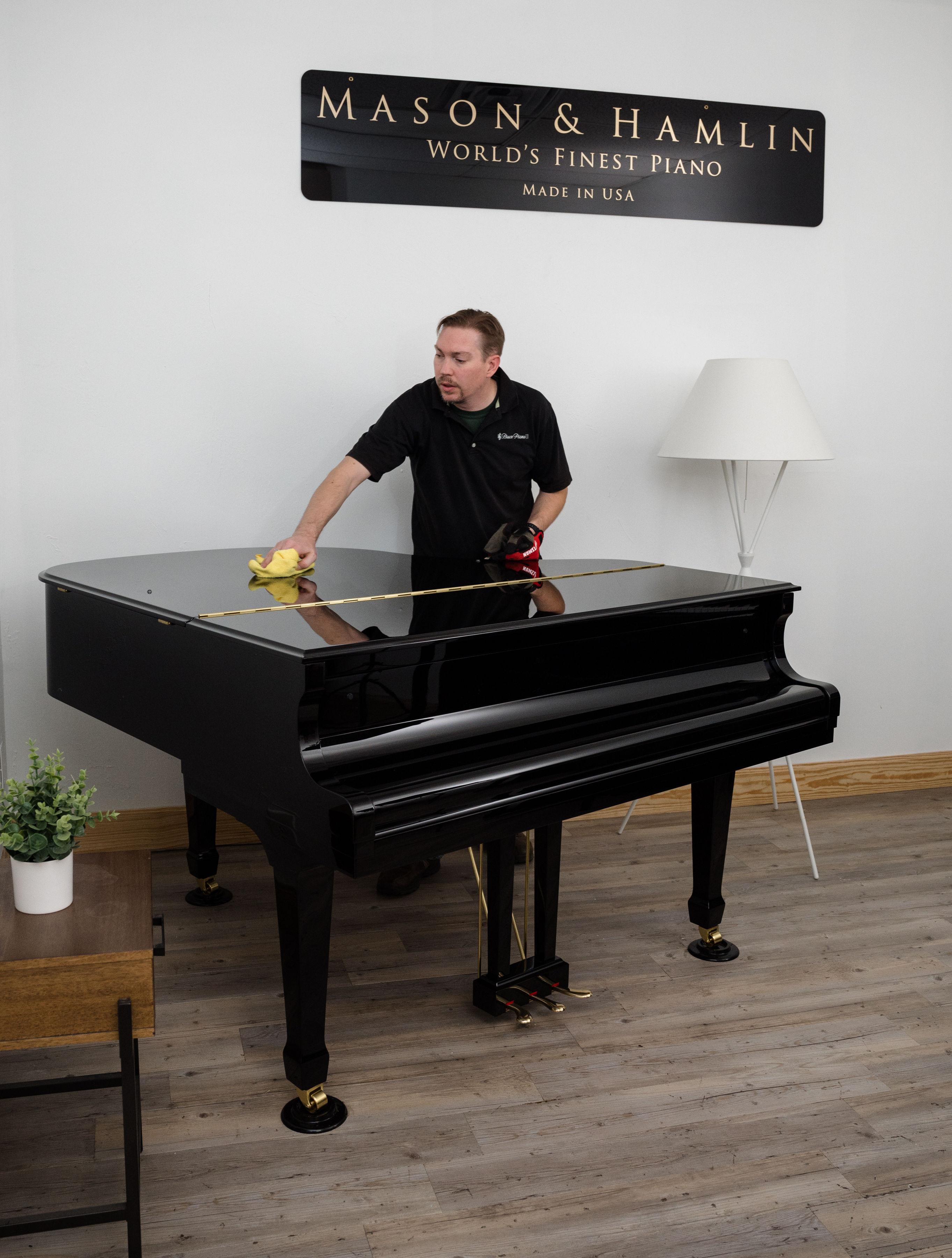 Jordan Polishing a Grand Piano