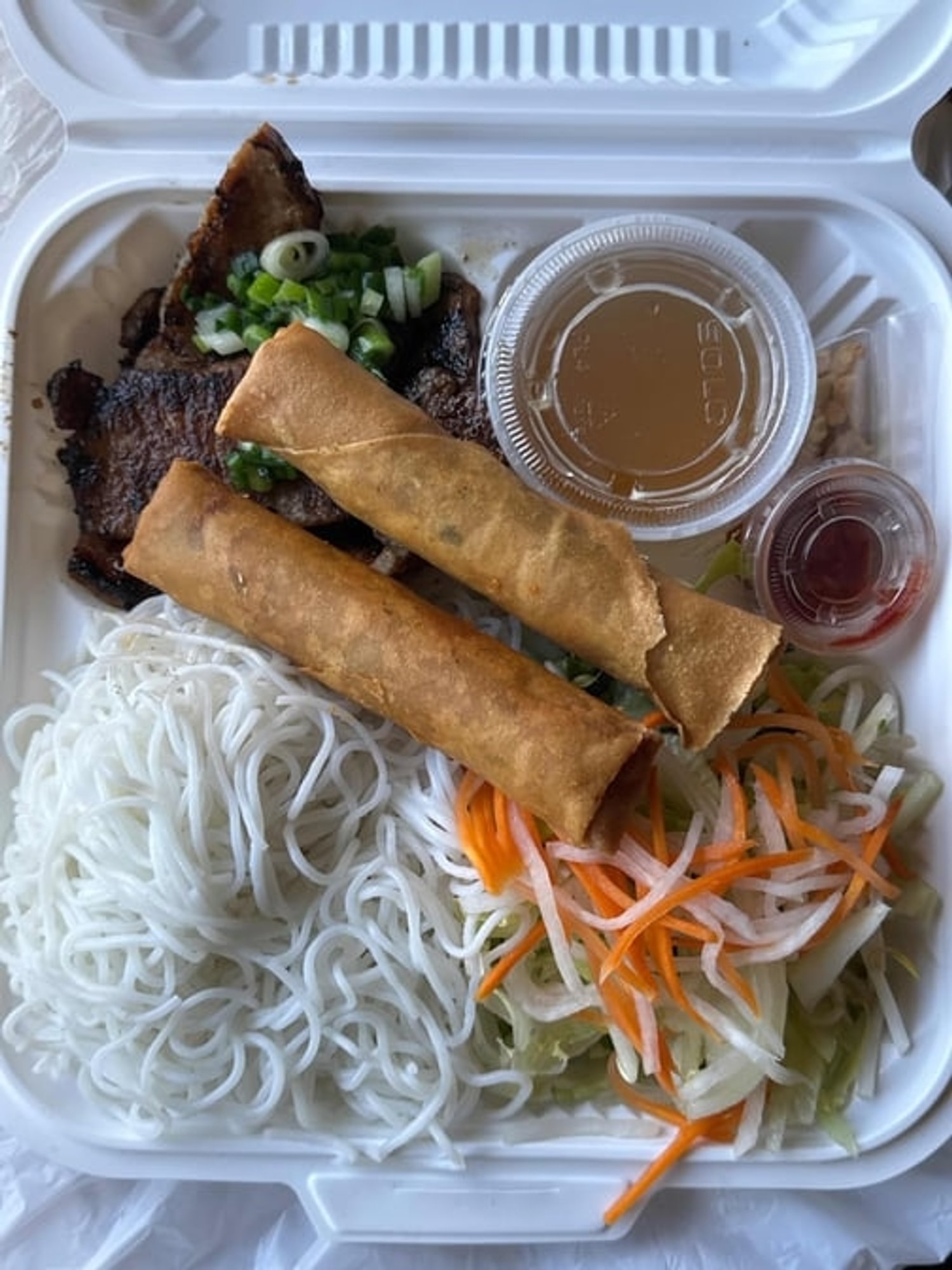 #36 Grilled Pork & Egg Rolls Over Vermicelli