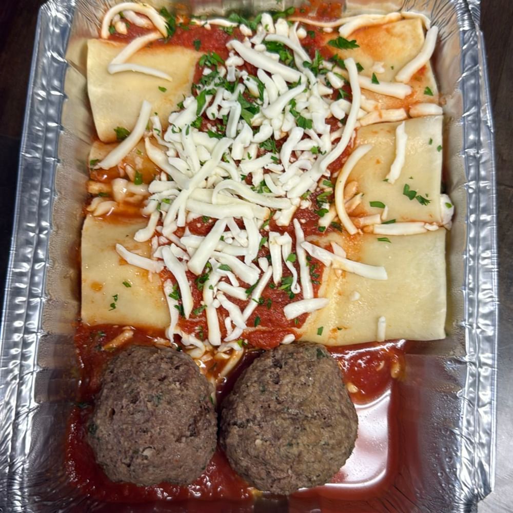 3 Piece Manicotti with 2 Meatballs and Marinara Sauce.