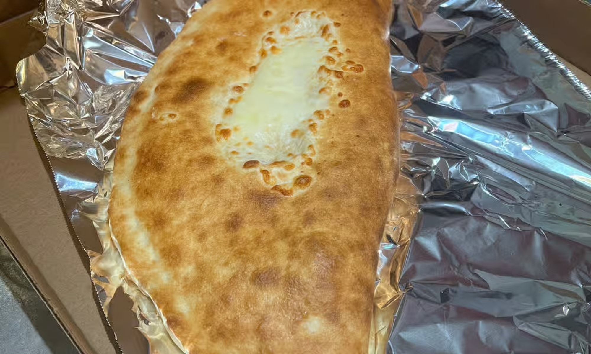 Small 1. Cheese Trio Calzone