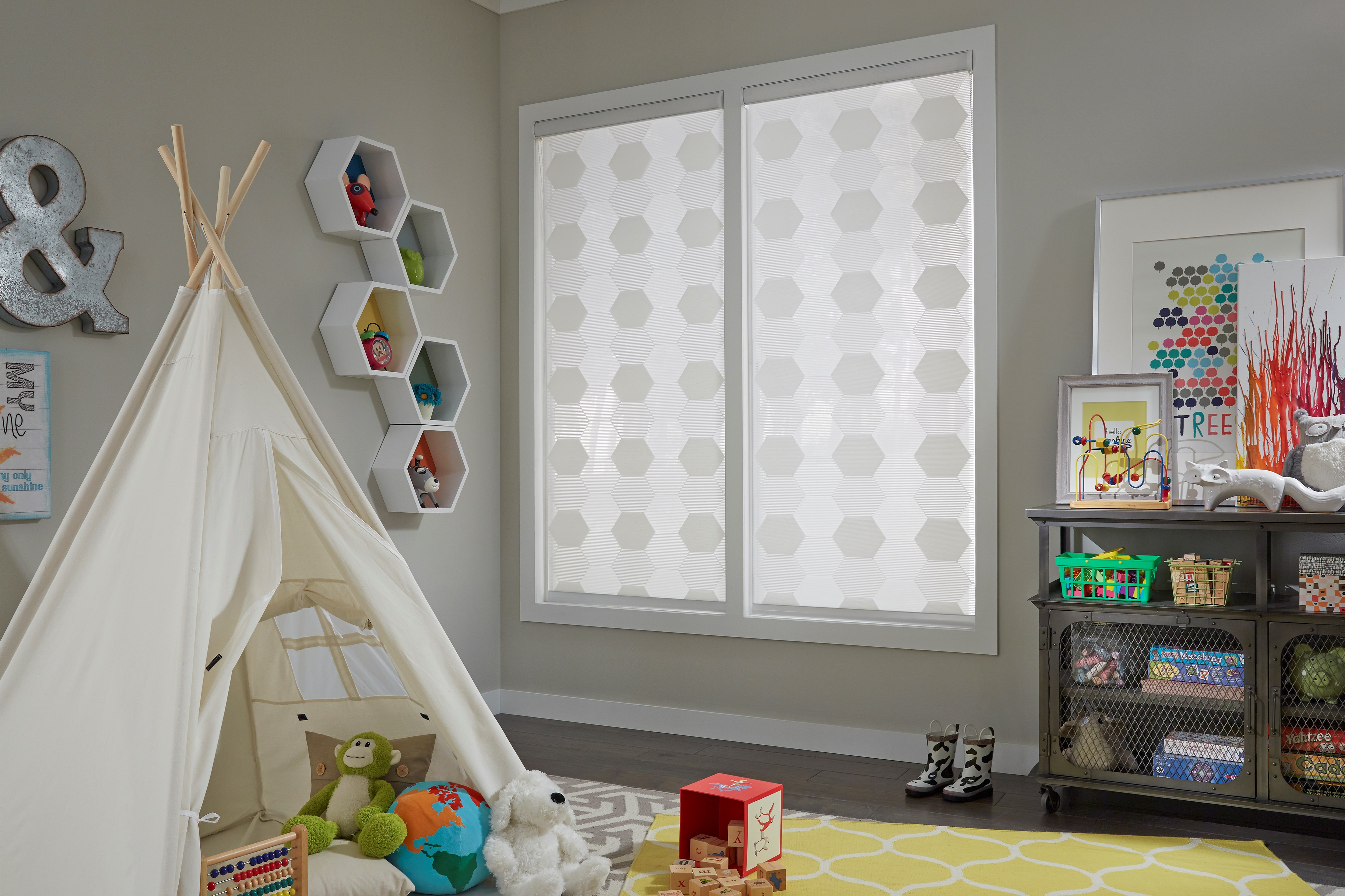 Cordless roller shades are the perfect safe option for your child's playroom! These shades illuminate the room, making the space bright and colorful for your children and their friends. Plus, they can come motorized to make use even simpler!