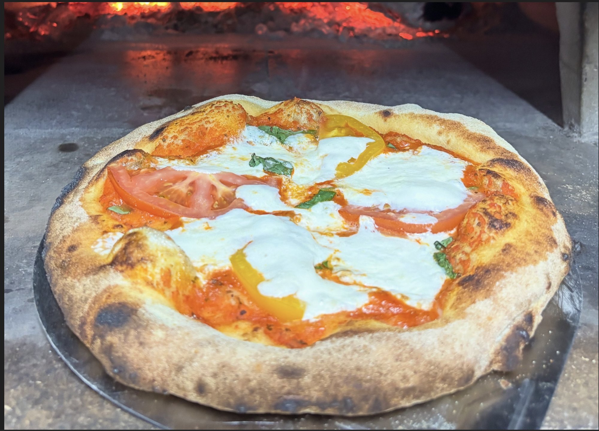 Margherita Pizza (Tomatoes, Buffalo Mozzerella)