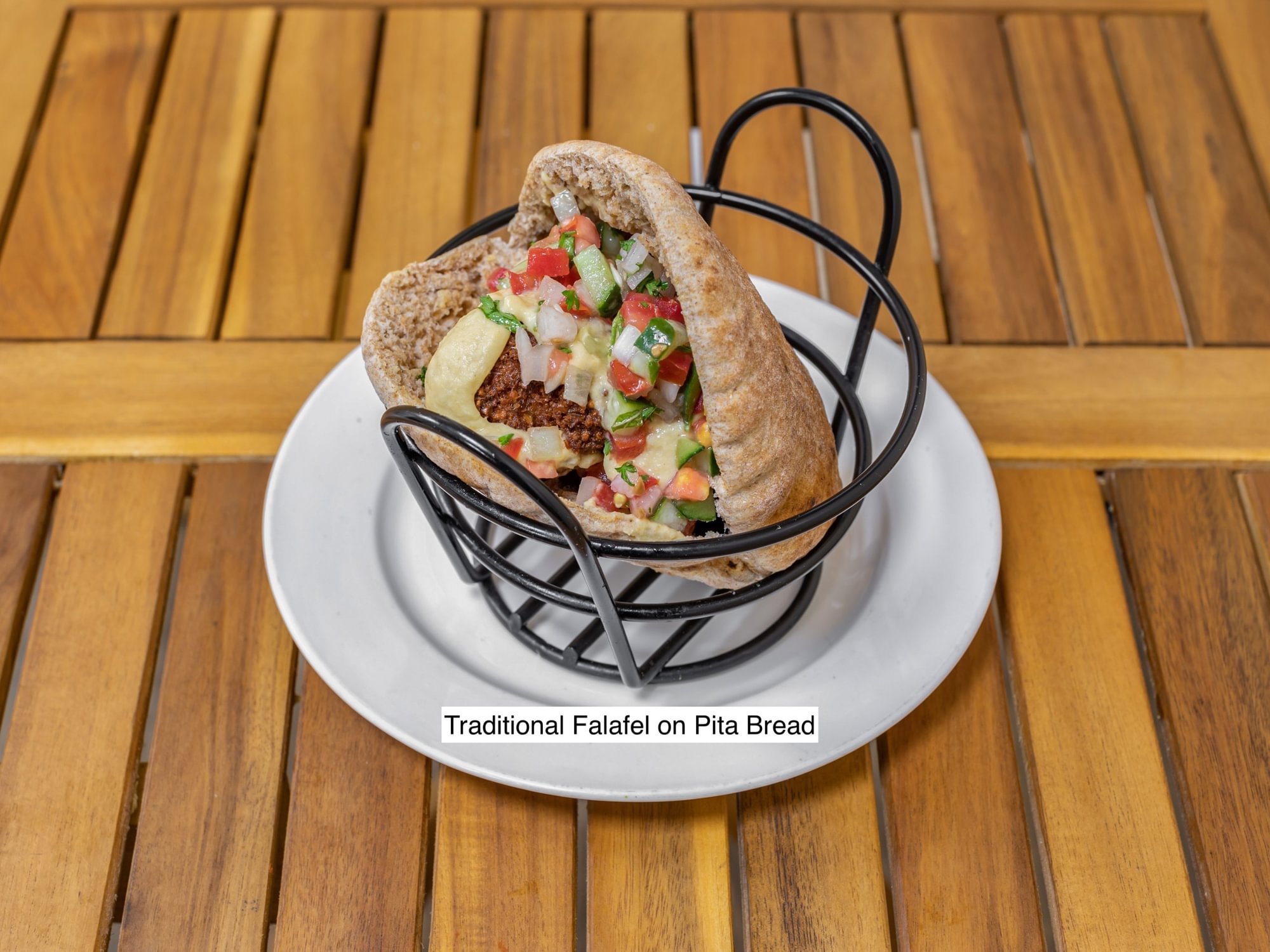 Traditional Chickpea Falafel, tahini, hummus, israeli salad