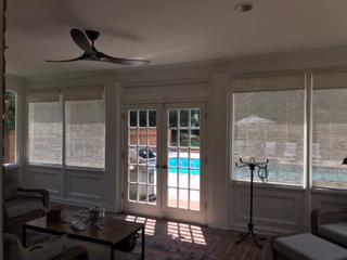 Woven Wood Shades are perfect for this sun room by the pool