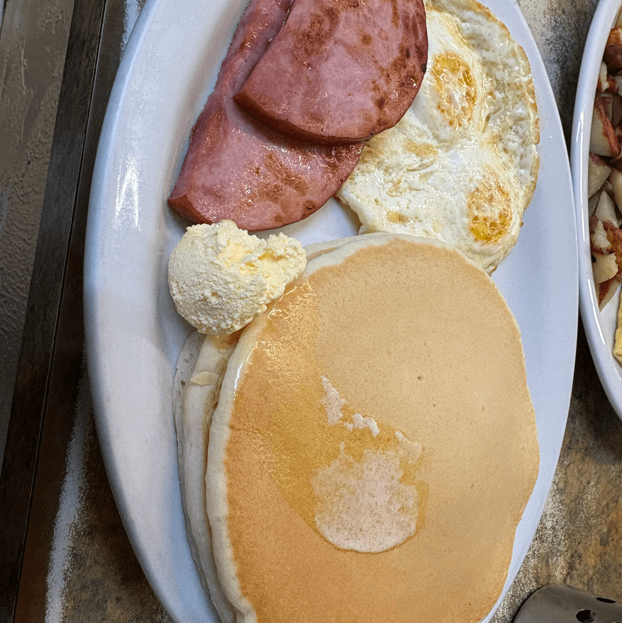Two Pancakes, 2 Eggs. (Bacon, Link or Patty Sausage, or Ham)