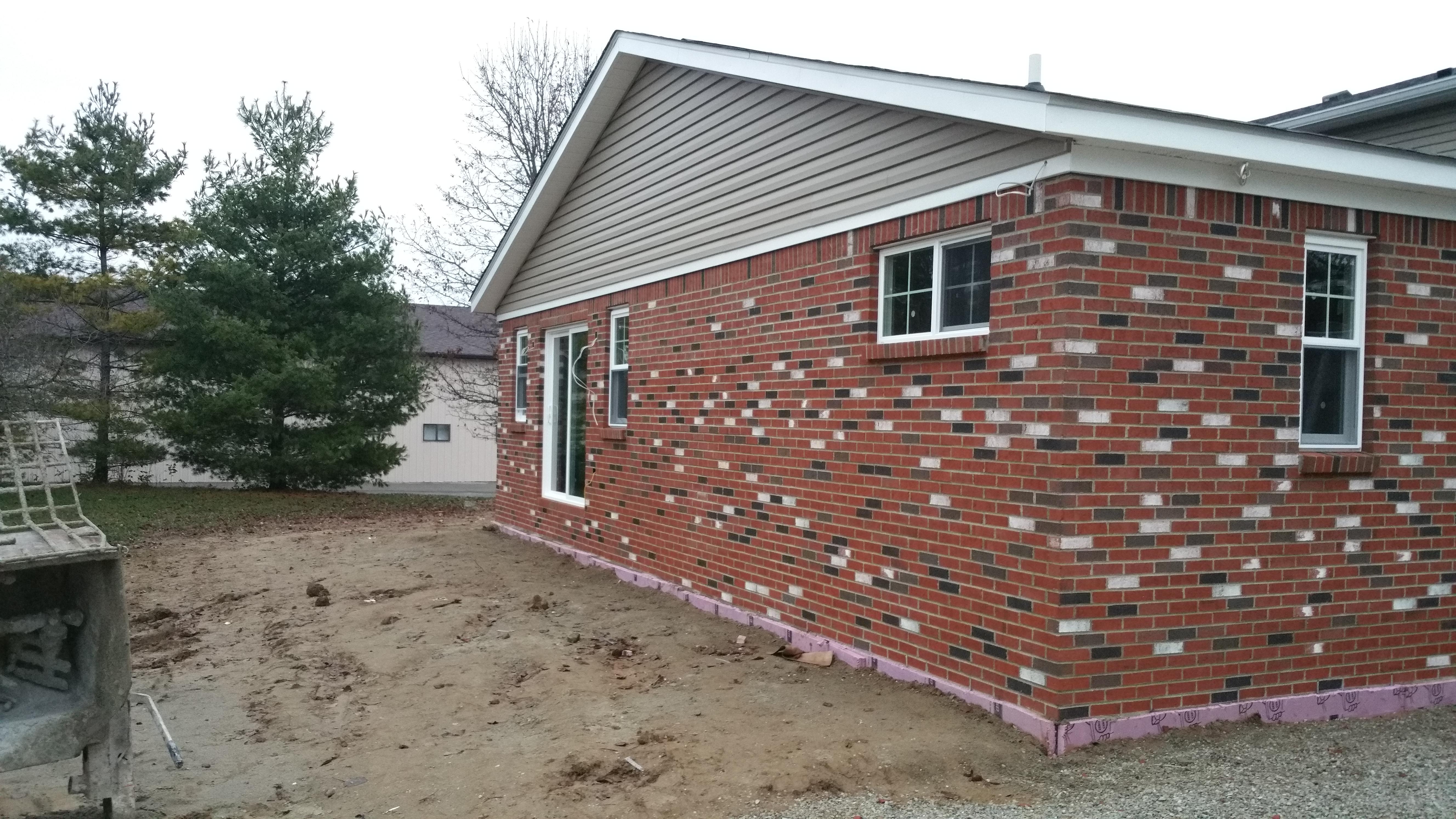 Here is a room addition we actually had to lay different types of brick and blend them together to match the rest of the house