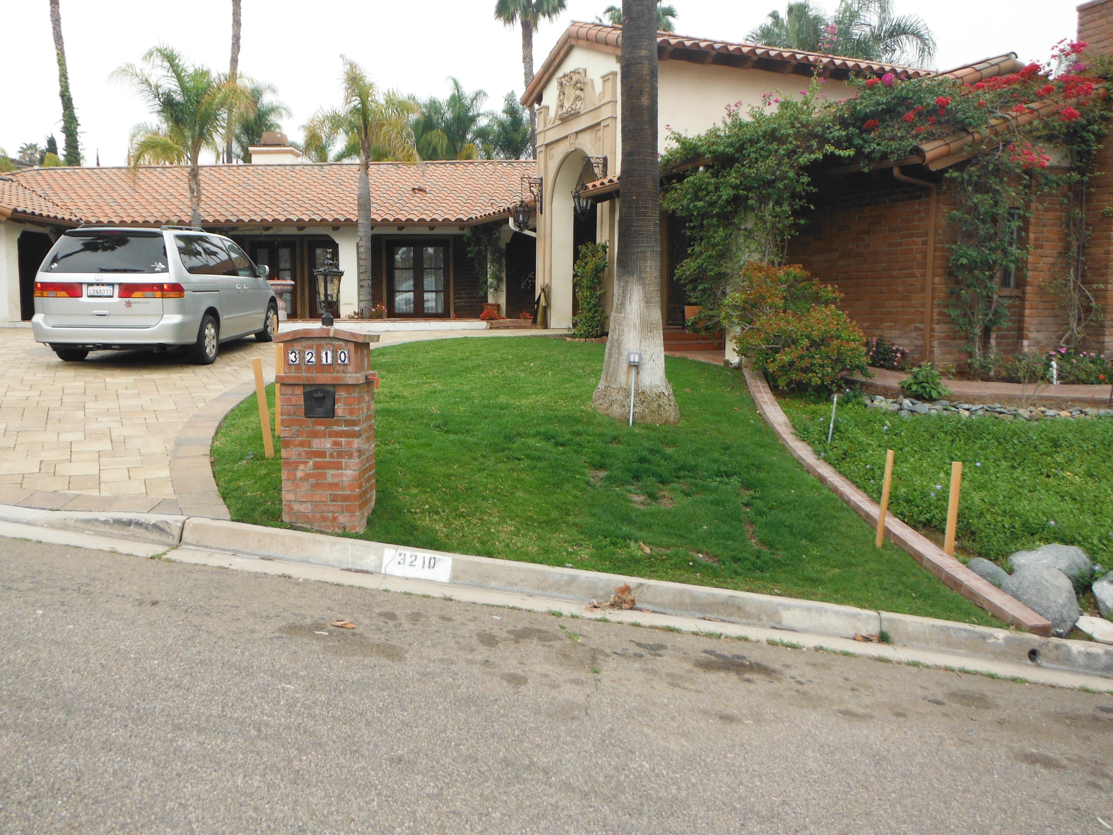 My client wanted to get rid of the grass and put in a desert front entry centered around an old cannon that he had collected. 