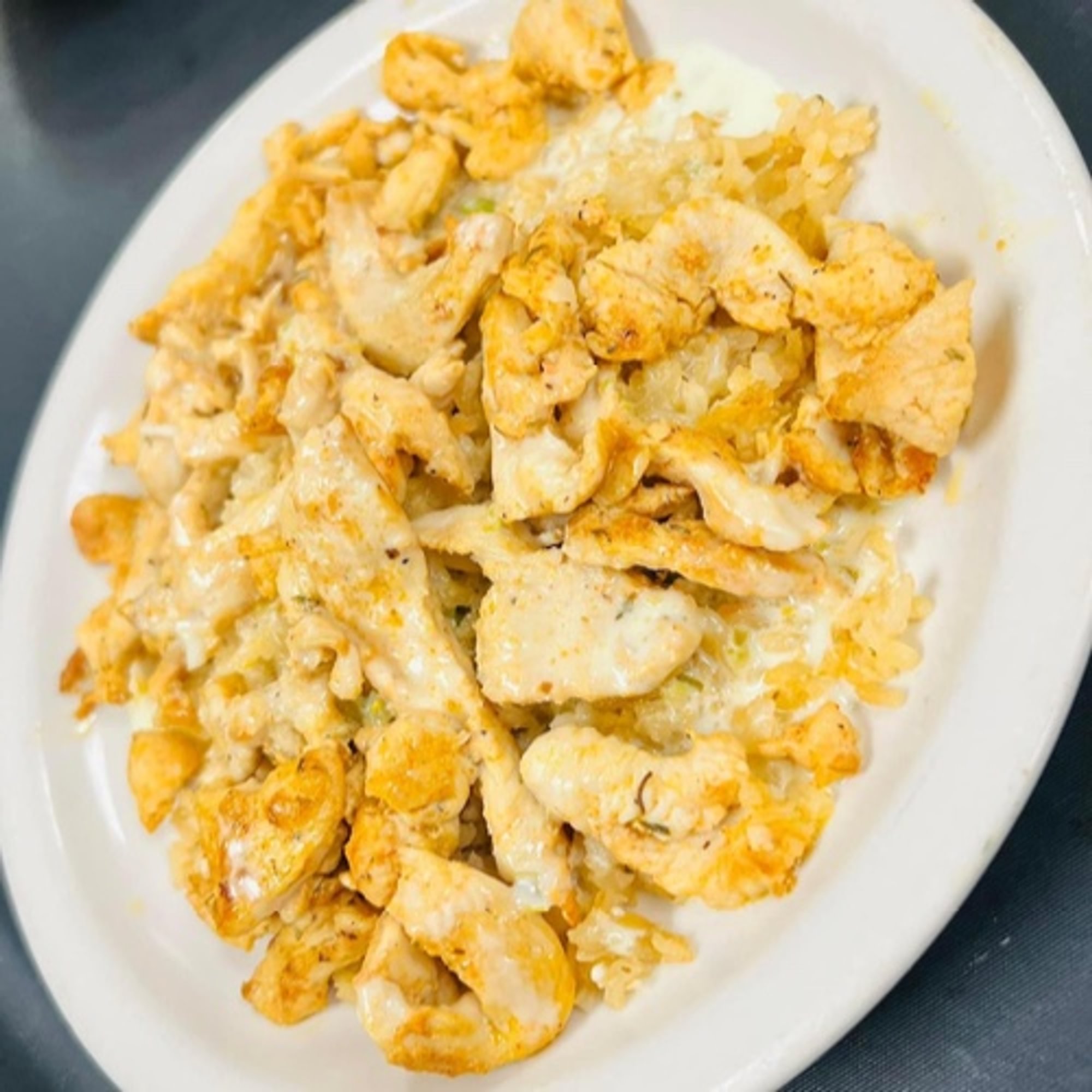 L Arroz con Pollo