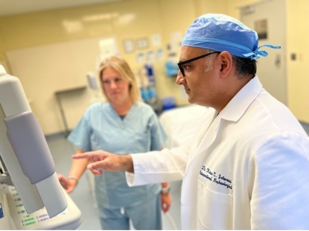 Dr. Manish Kiran Jotwani, MD and a nurse