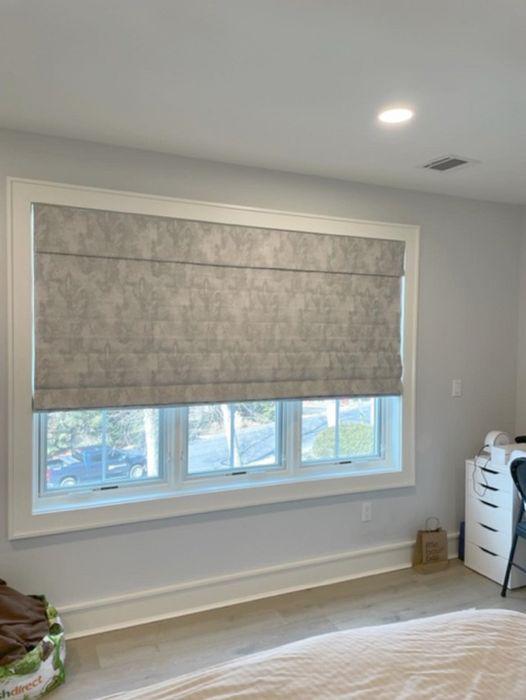 When fabric comes to life.... We added this cordless room darkening Roman shade to this teens room for a little glam...