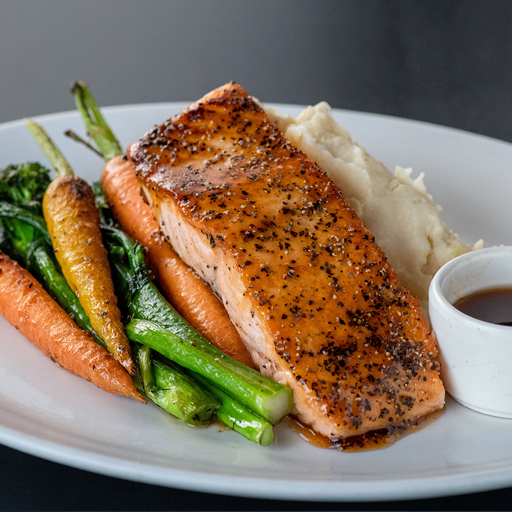 Yard House offers a variety of seafood options, such as the Whiskey Glazed Salmon.