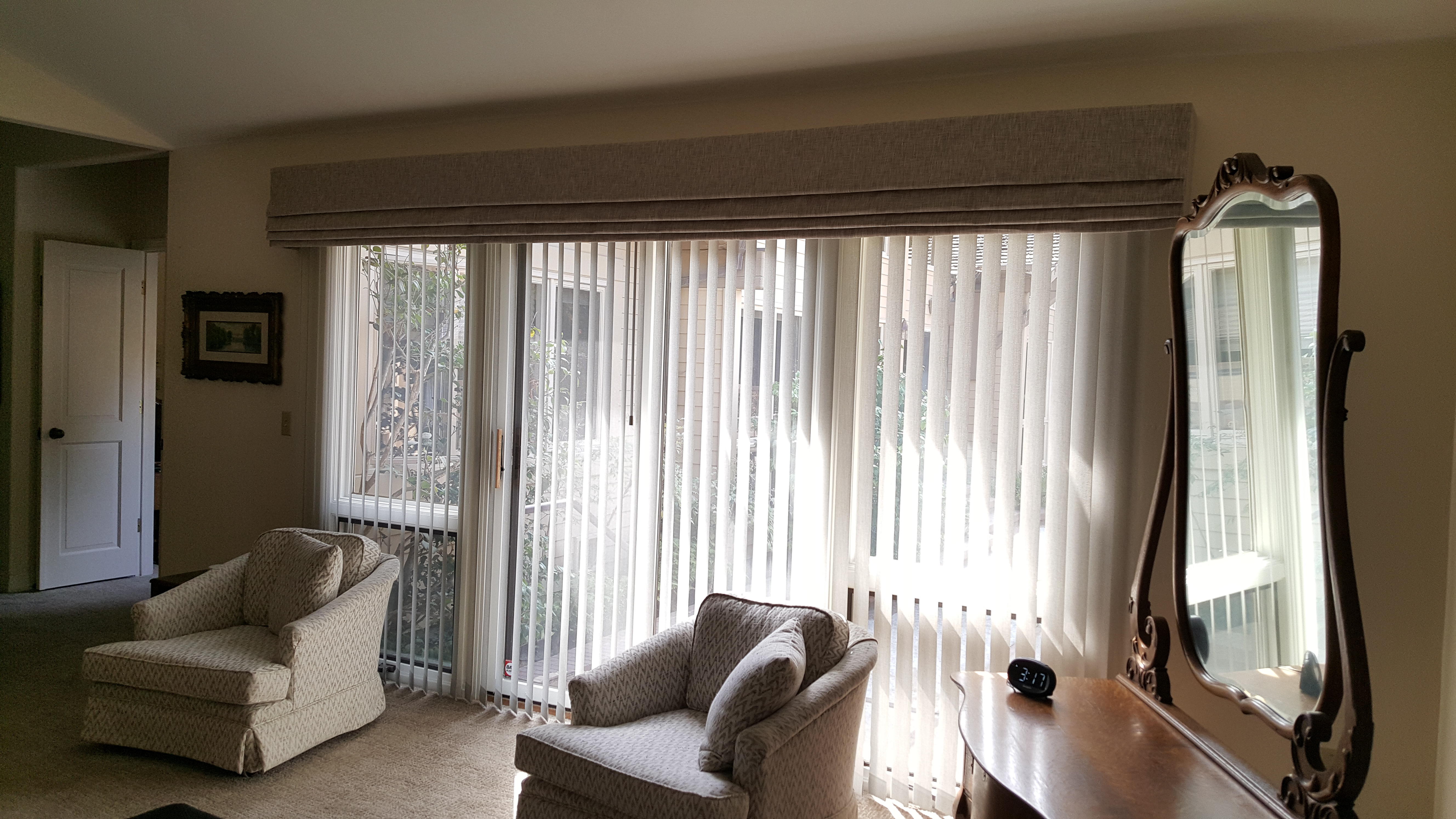 Large Roman valance over Vertical Blind in a master bedroom