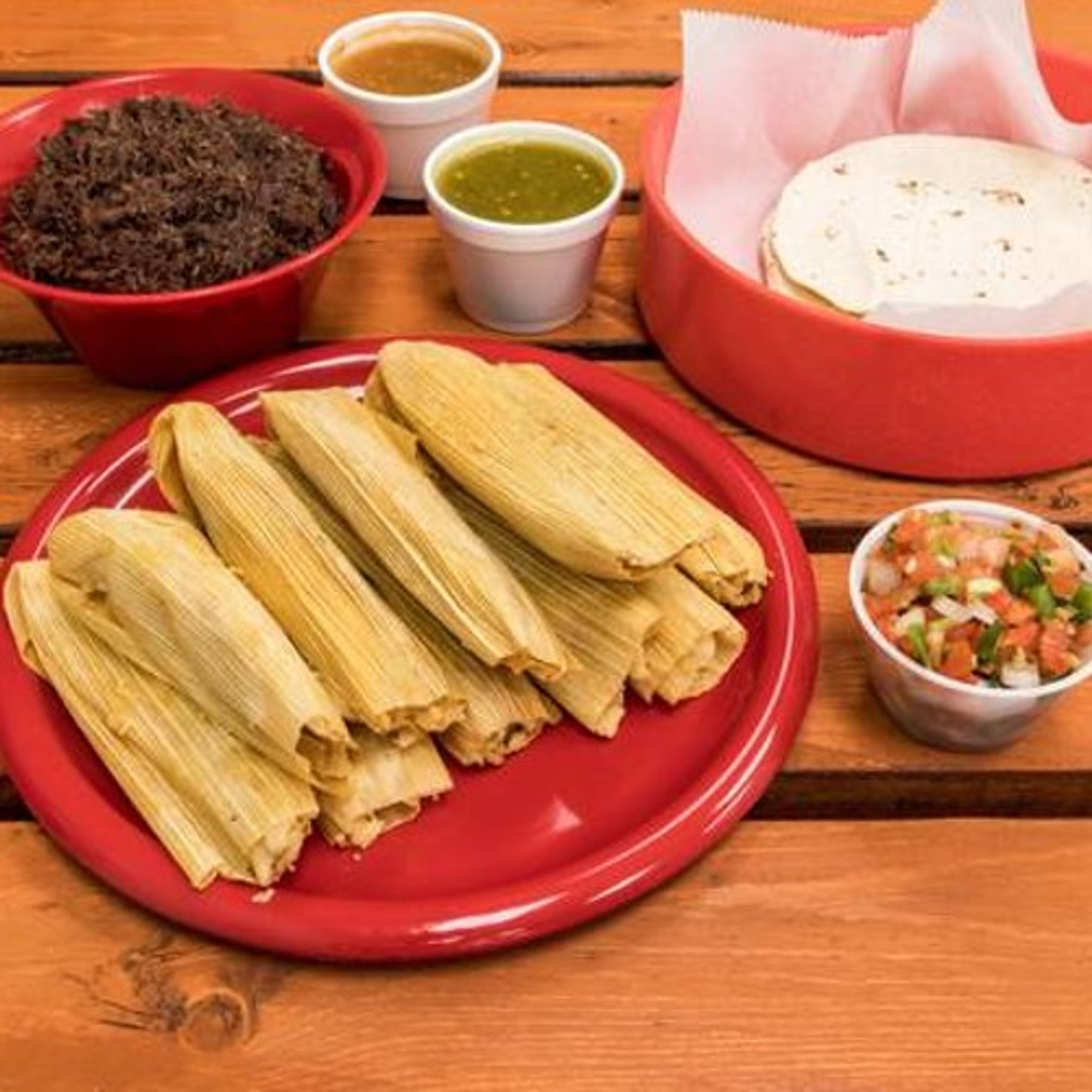 1 Lb Barbacoa, 10 Flour Tortillas, 1 Salsa (4 Oz), Handmade Tamales (1 Dozen)