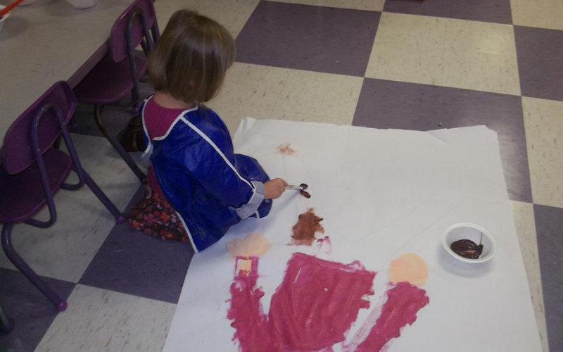 One of our Preschool Classroom students enjoys painting