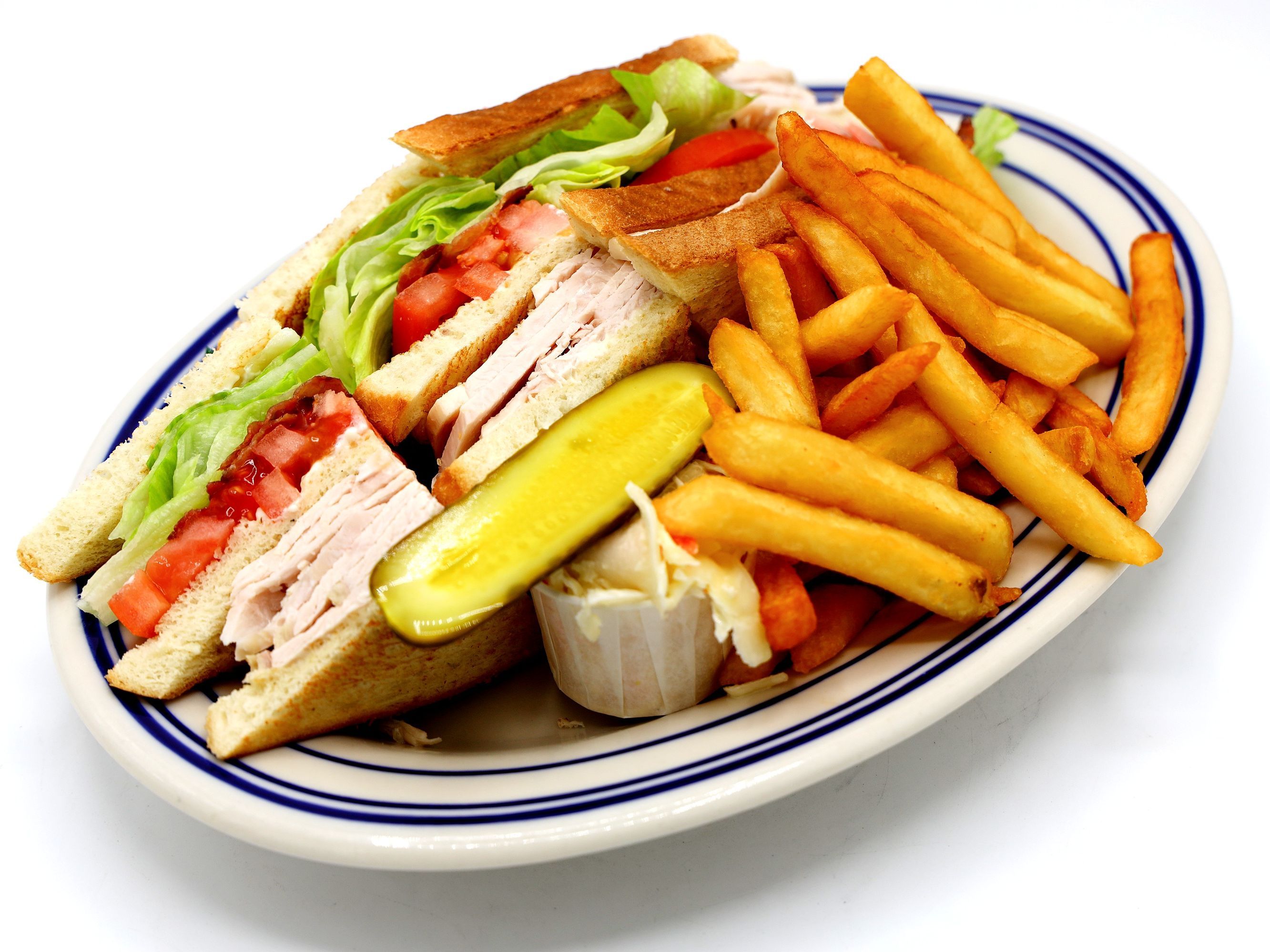 Club sandwich with fries