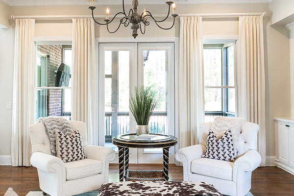 Add tone-on-tone drapery panels to your windows to bring a sense of calm to your space.