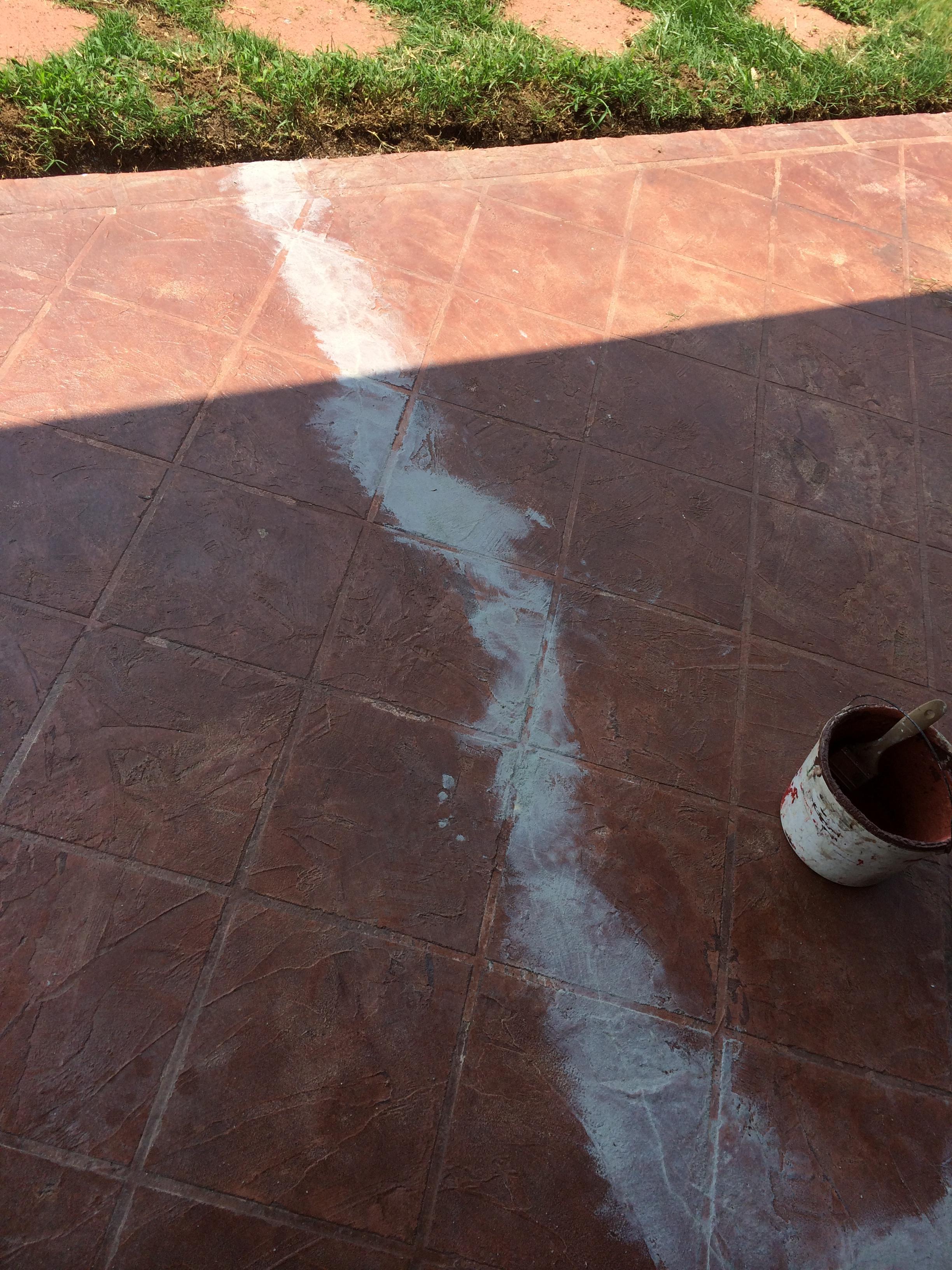 Fixed cracks in the patio before painting