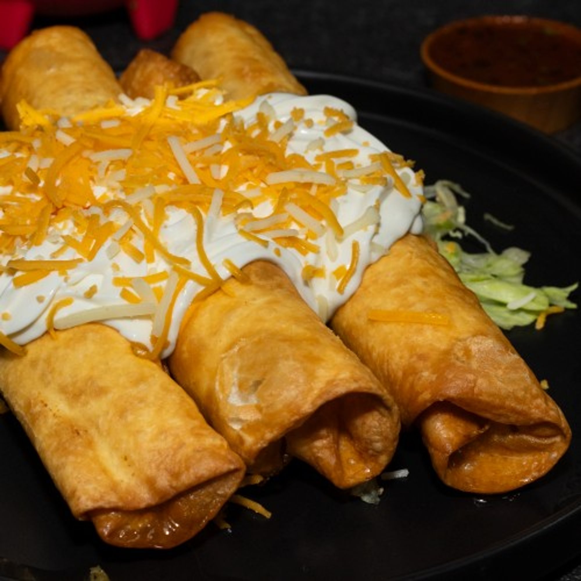 3 Flautas with Sour Cream Plate