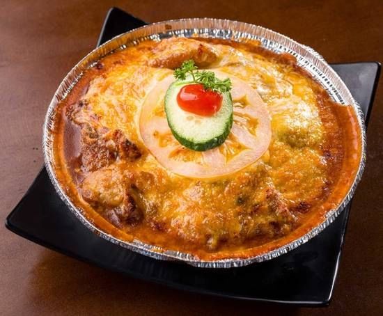 Baked Pork Chop with Cheese over Spaghetti
