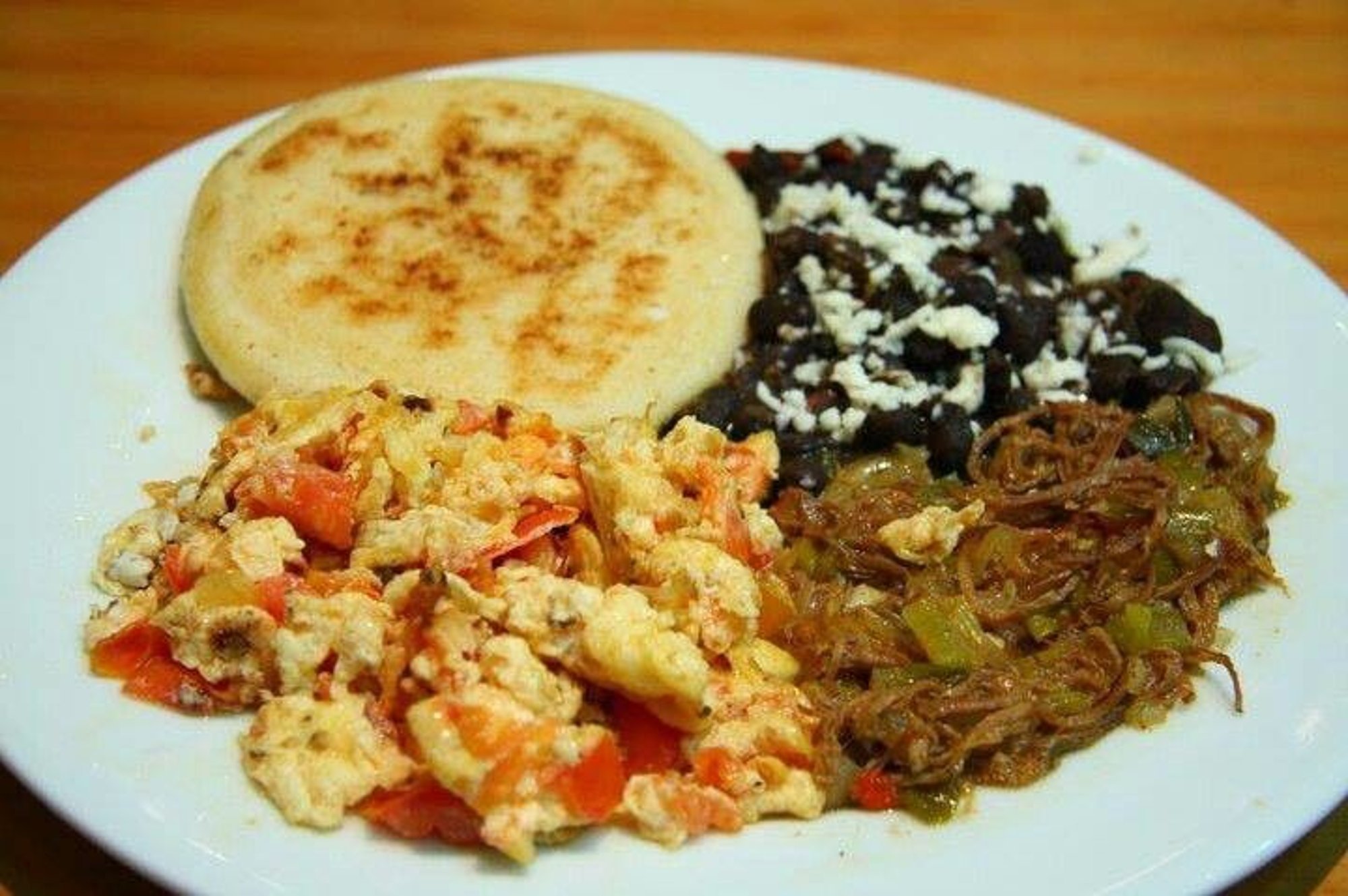 Venezuelan Breakfast (Arepa, Egg, Caraota, Mechada, Cheese)