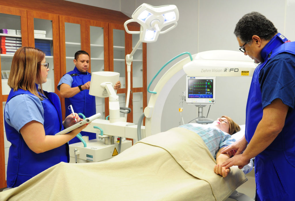 A patient and staff at Azura Vascular Care Puerto Rico
