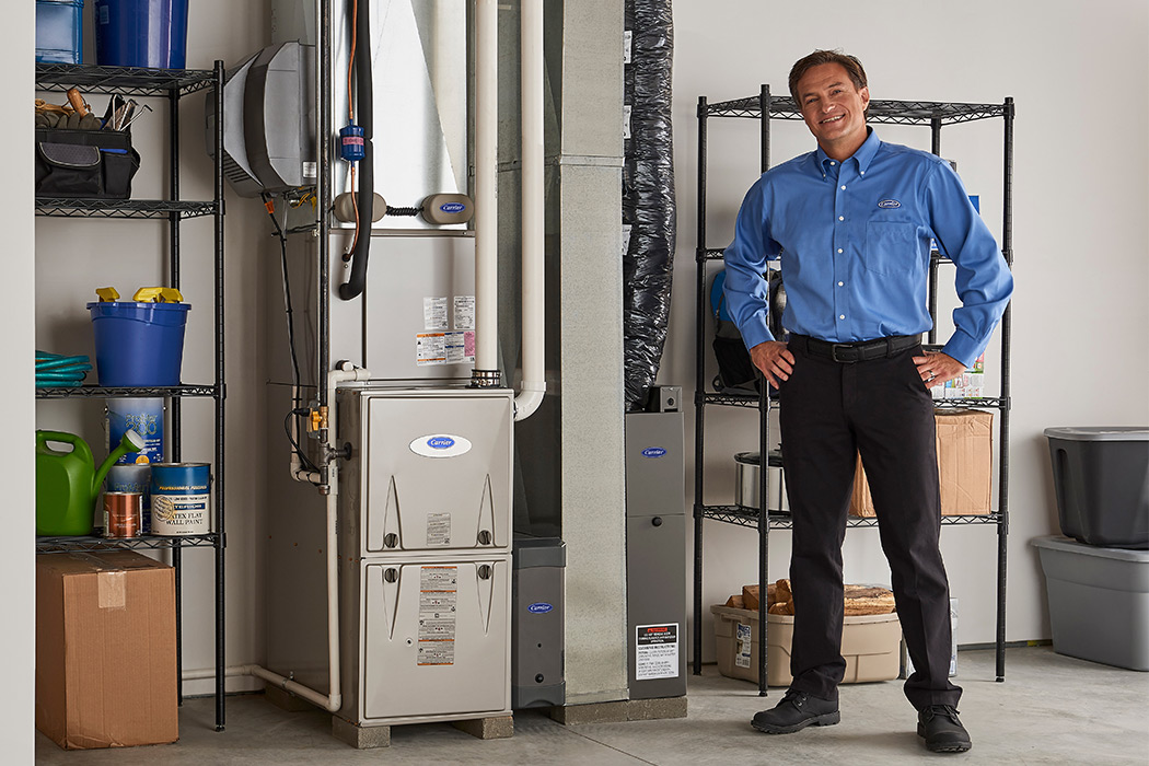 A Carrier dealer finishes performing HVAC installation