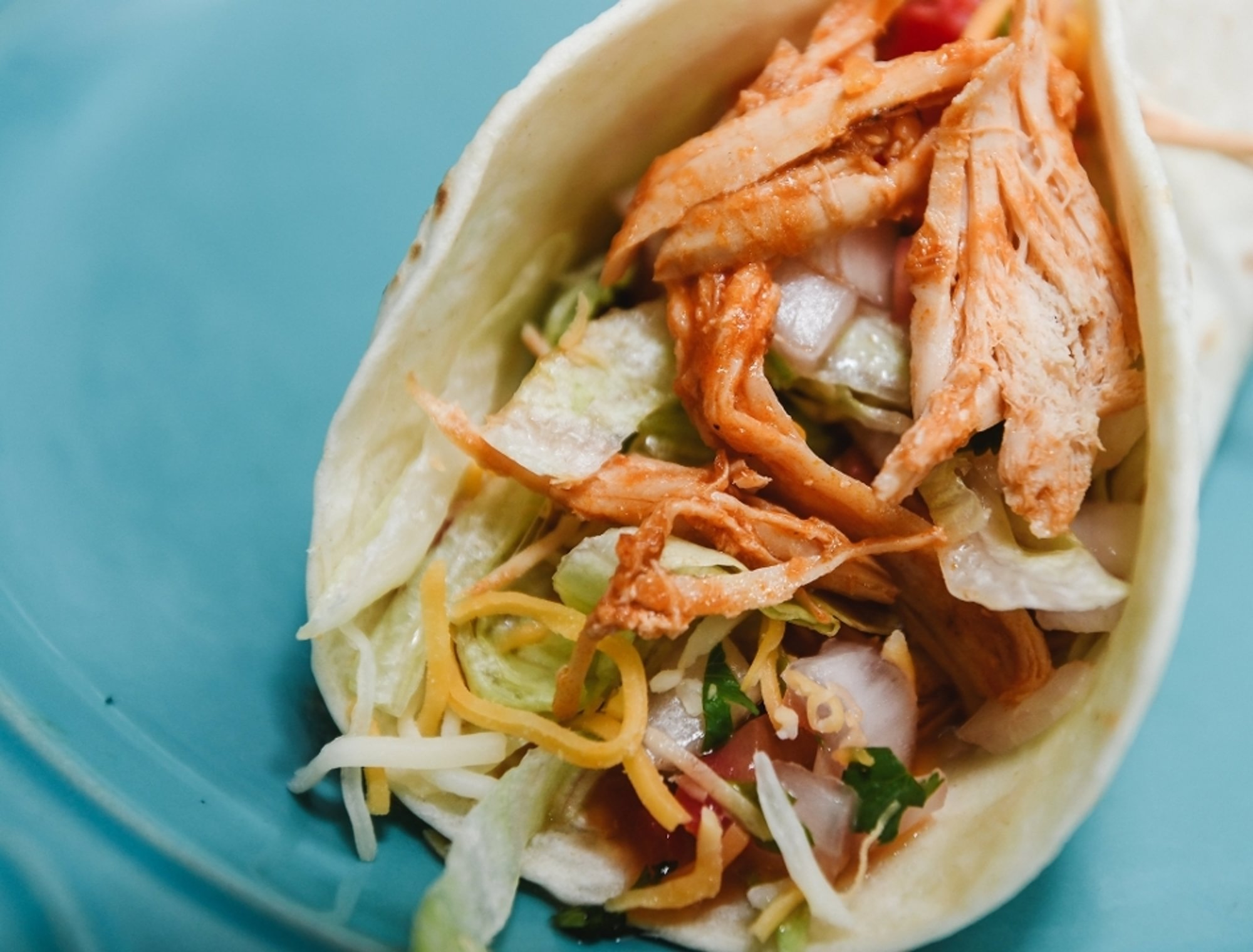 Soft tortilla shredded chicken taco
