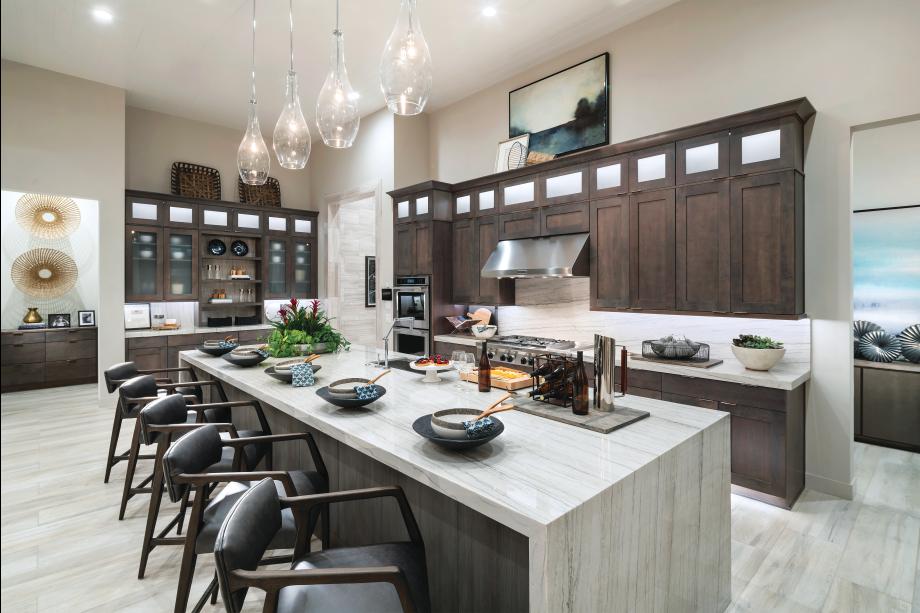 Well-equipped kitchens with ample countertop and cabinet space and large center islands