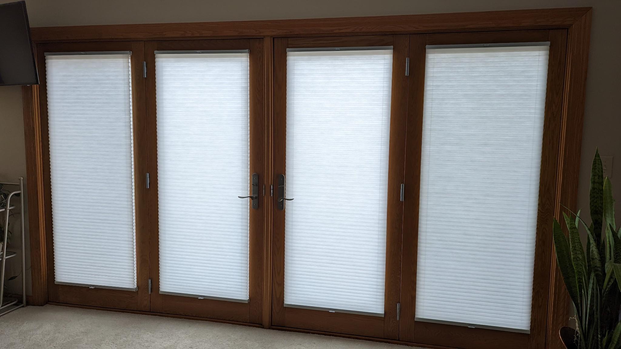 Enhance your patio doors with our Cellular Shades. We employ experts who can ensure your window solutions are properly installed for the best results in your home in Cedar Falls.