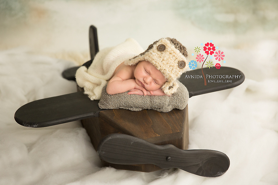 Flying on cloud nine...by Avnida Photography, a premier Newborn Photographer NJ