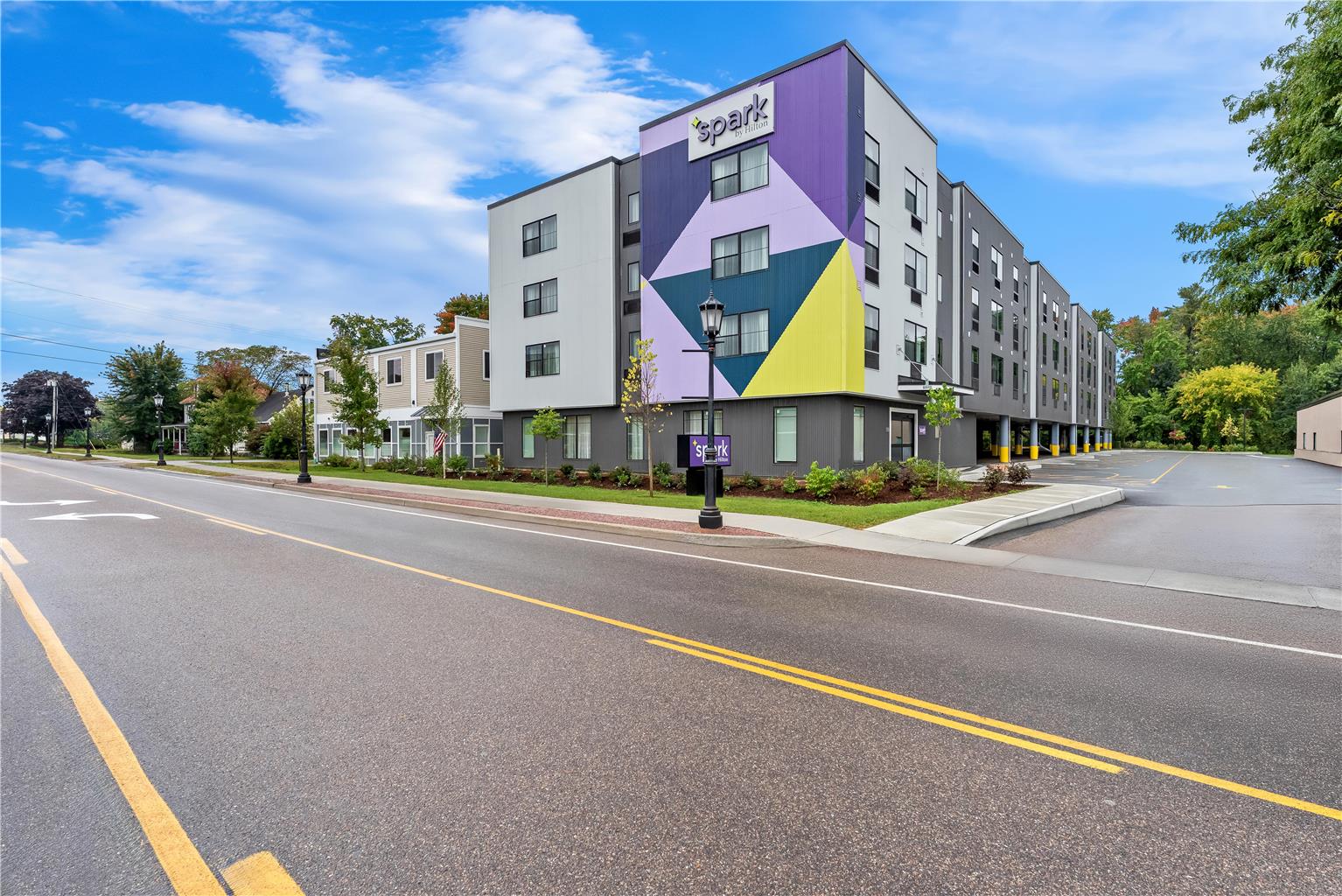 Spark by Hilton Essex Junction Burlington Logo