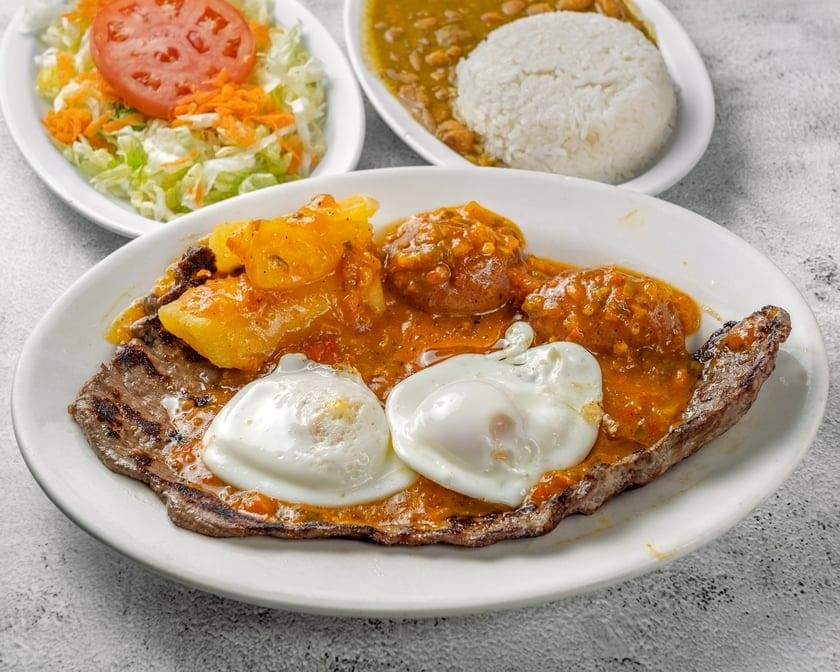 Bistec a Caballo / Grilled Steak with Creole Sauce & Egg