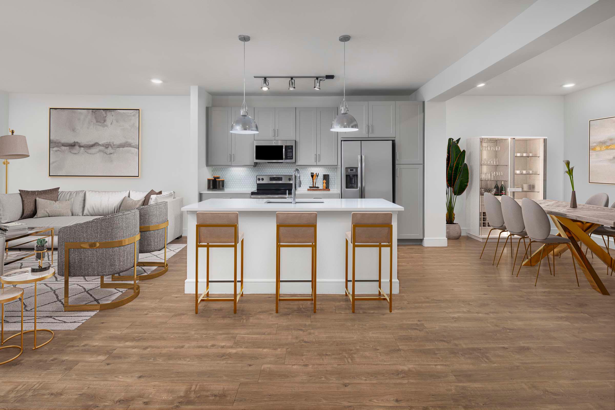 Villas townhome kitchen with gray cabinets and an island at Camden Greenville