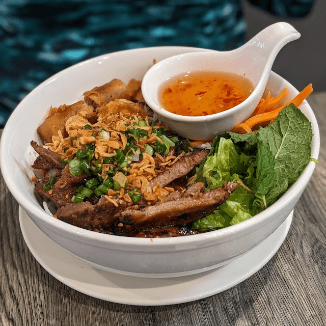 G1. Combo Grilled (Beef, Pork, or Chicken) and Egg Rolls Rice or Vermicelli Noodle