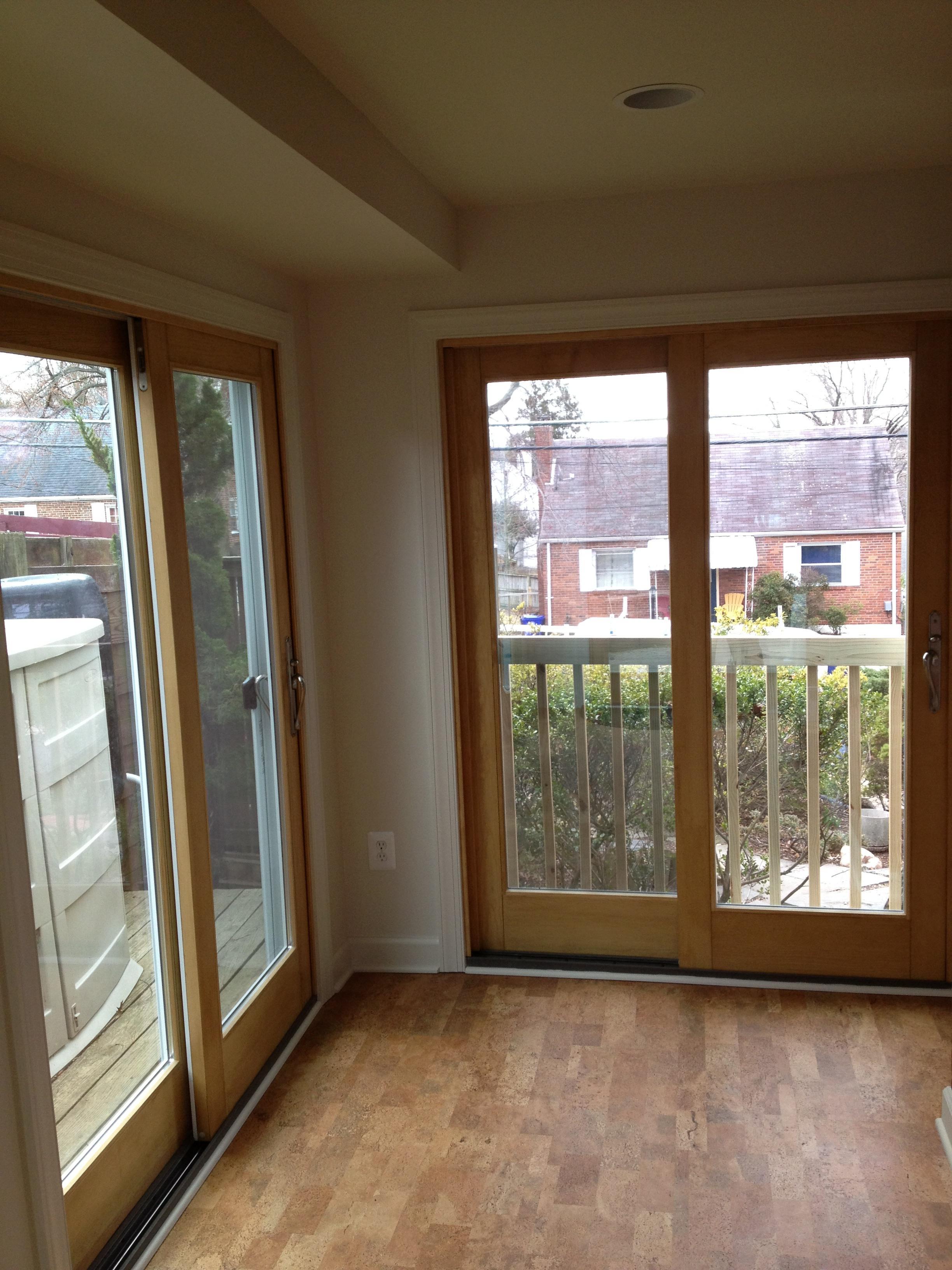 Removed old windows, reframed with new Anderson doors, drywall, cork floors, and Minisplit HVAC unit.