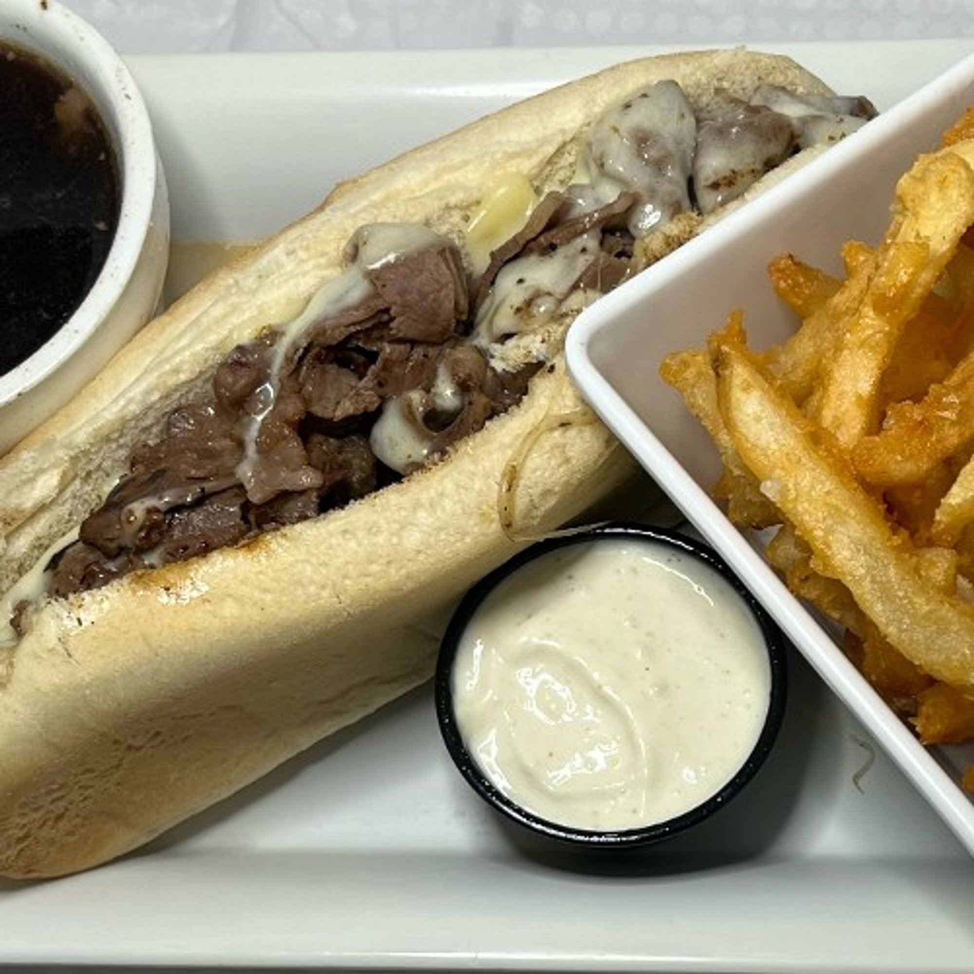 Slow Roasted Prime Rib French Dip Sandwich