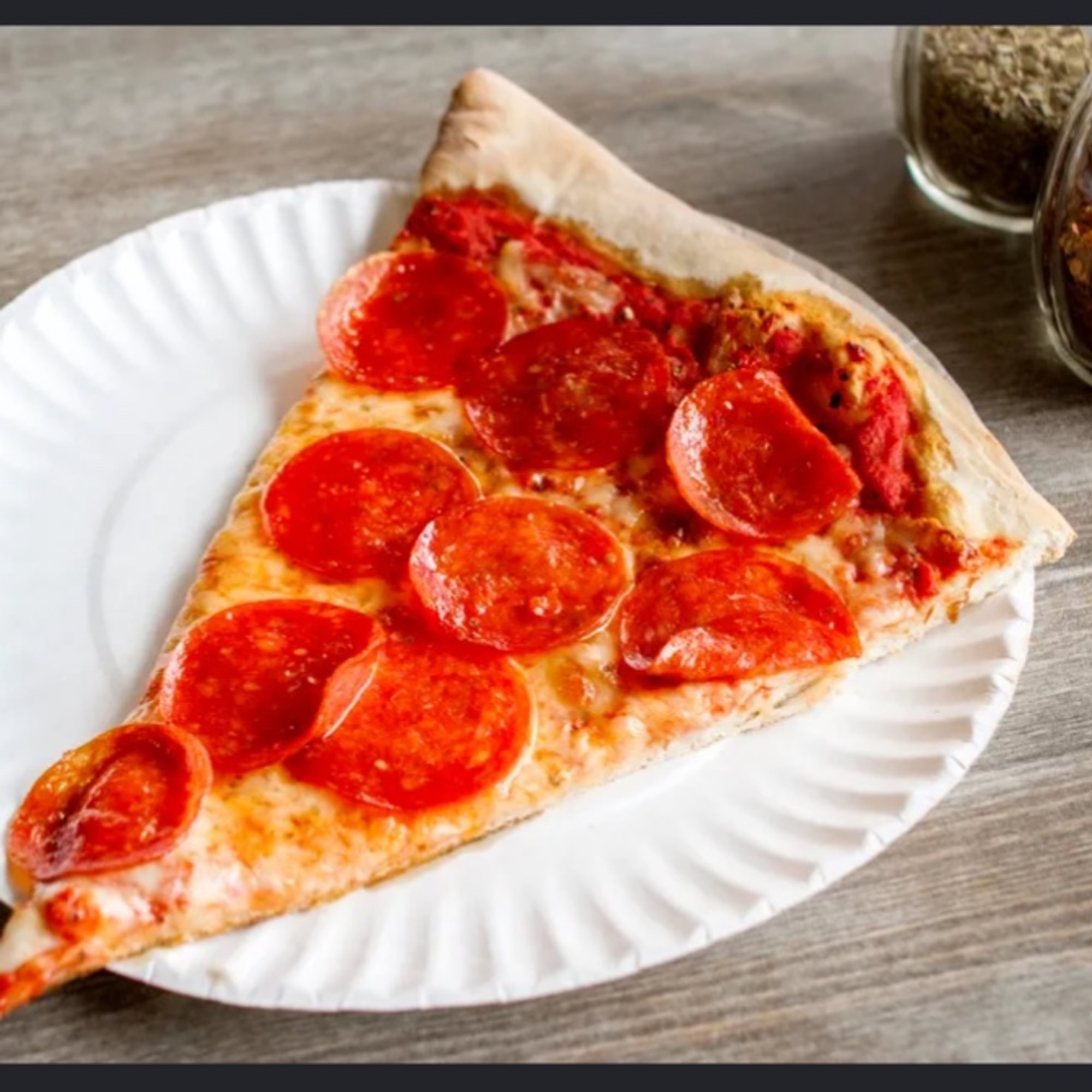 Pizza Slice With Toppings