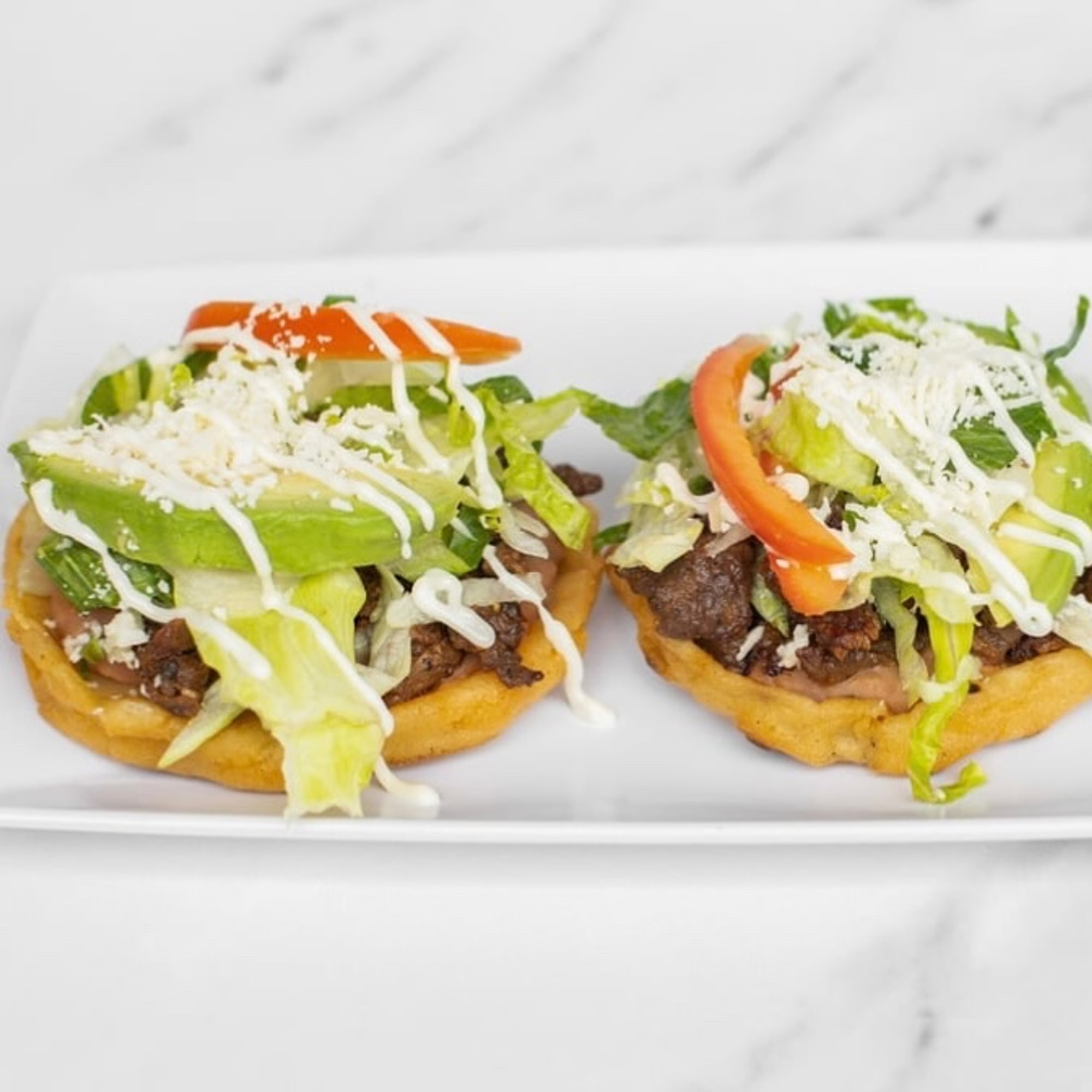 Sopes (Thick Corn Cakes)